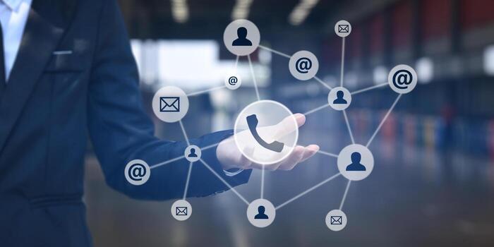 Businessman shows outstretched hand with social icon on virtual screen contact us free photo